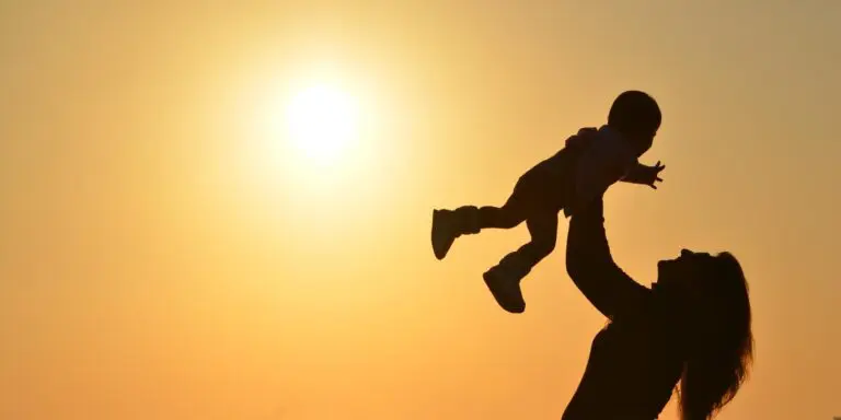 Doctor providing chiropractic care to patient with eczema and ear infections