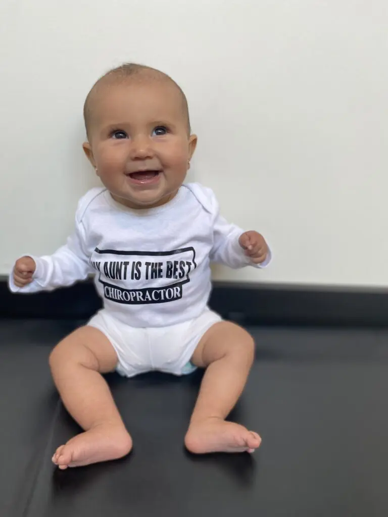 Close-up of a baby receiving chiropractic care at Foundation Chiropractic Co Oakville