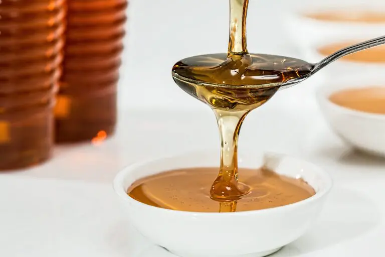 Close-up of organic honey syrup in a jar