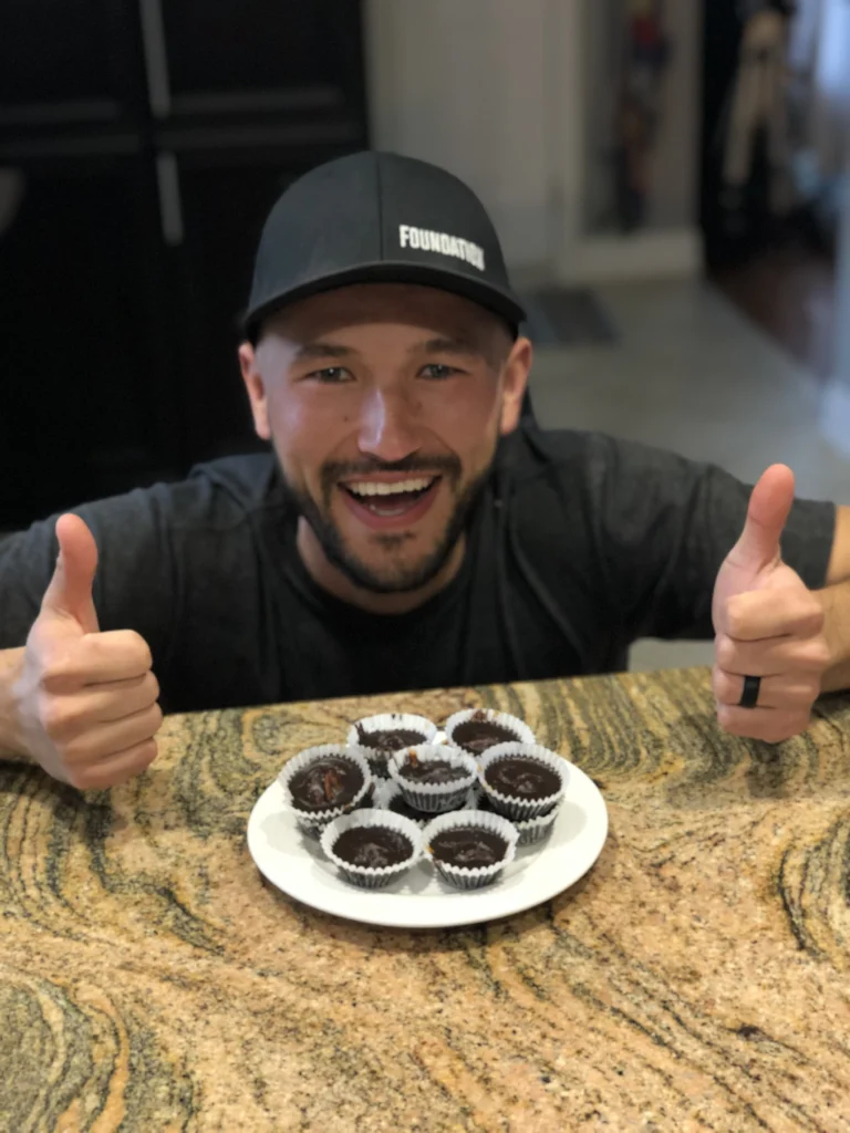 Close-up of natural peanut butter cups arranged on a wooden board